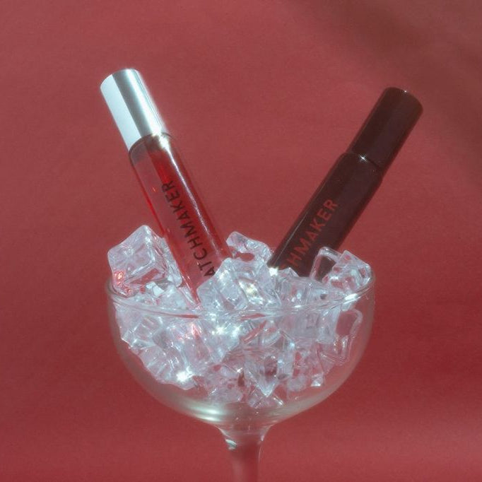 Eye of Love Matchmaker perfume and cologne in a cocktail glass with crystal ice cubes