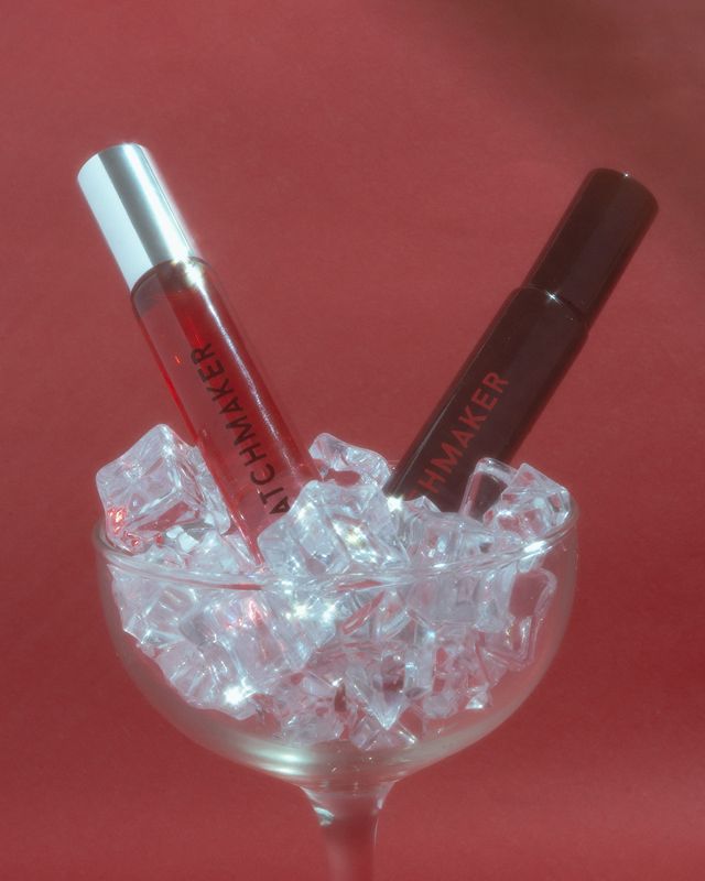 Eye of Love Matchmaker perfume and cologne in a cocktail glass with crystal ice cubes